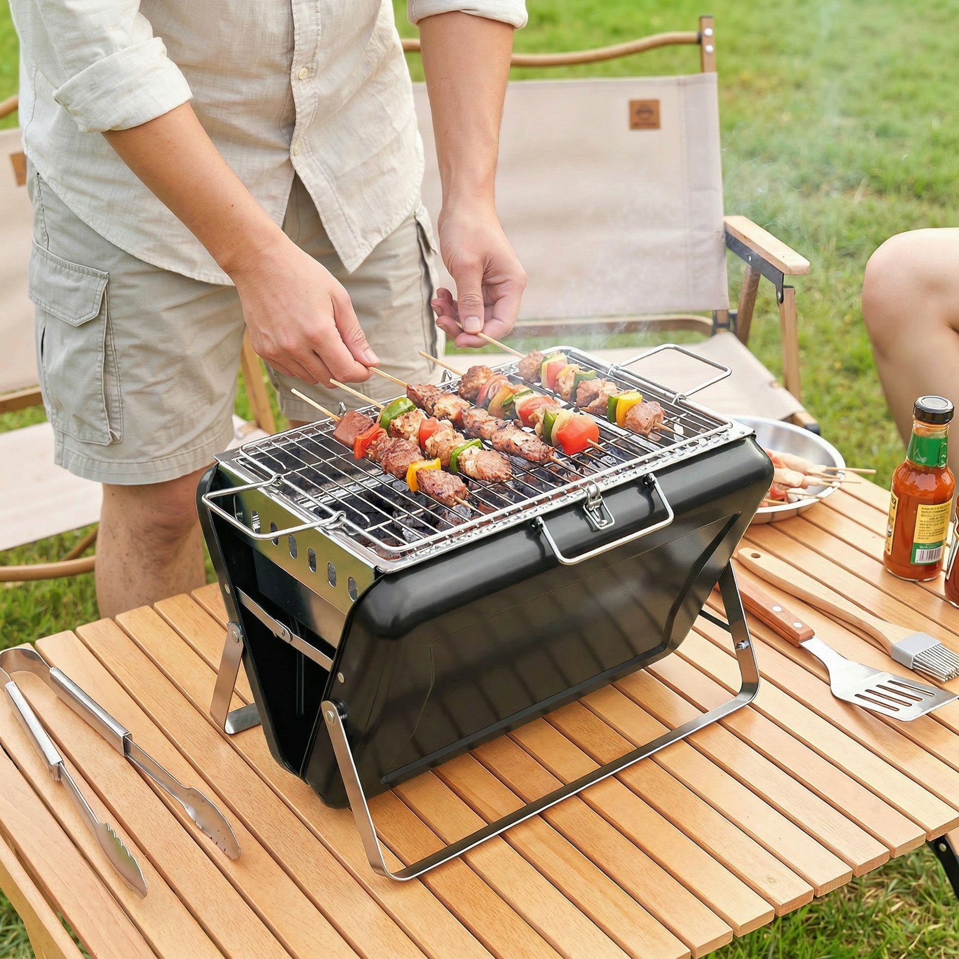 Portable BBQ Grill, Folding Charcoal Barbecue Grill with Handle and Foldable Legs for Camping Garden Outdoor Cooking, Black