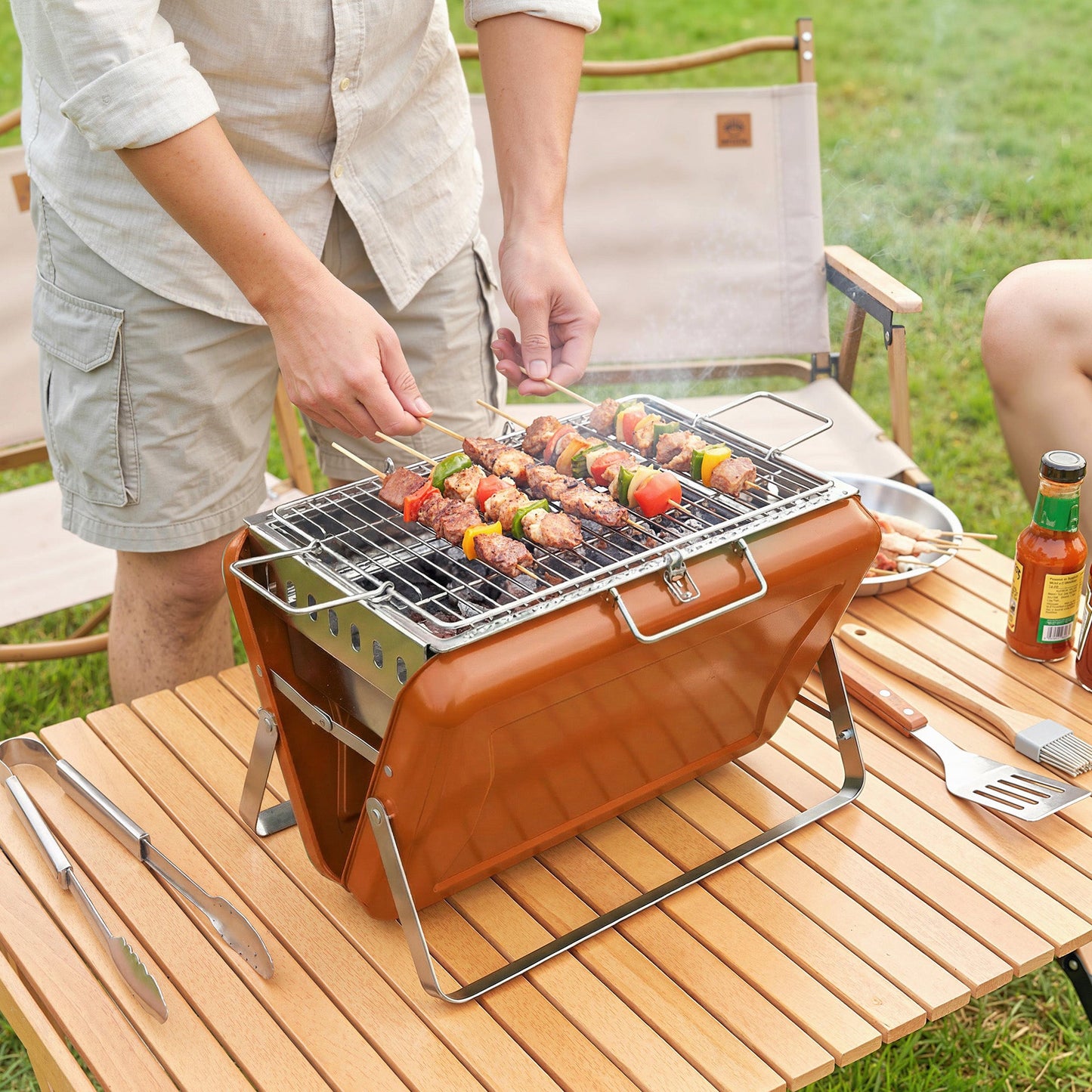 Portable BBQ Grill, Folding Charcoal Barbecue Grill with Handle and Foldable Legs for Camping Garden Outdoor Cooking, Orange